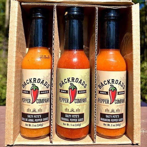 Salty Pete's three-bottle Hot Sauce Trio packaged in a divided box